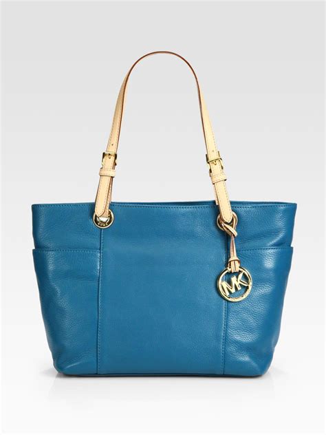 michael kors top zip turquoise bags|Michael Kors voyager tote.